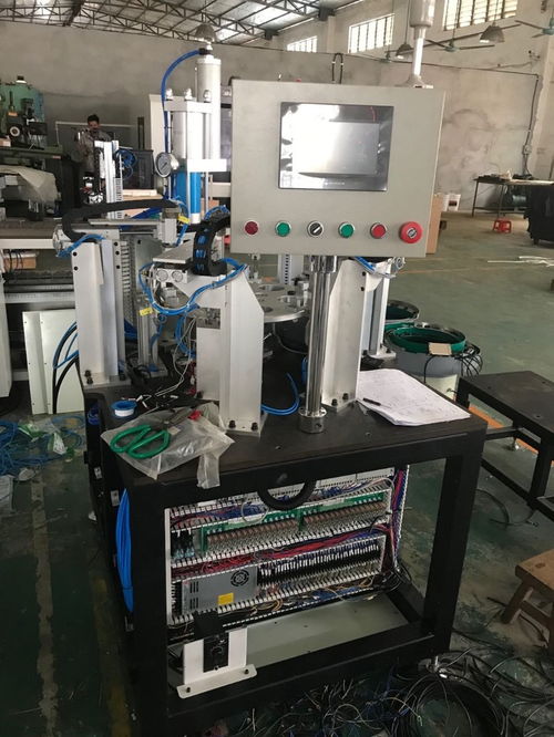 工厂自动化设备在铆钉组装中的应用 以照相器材为例